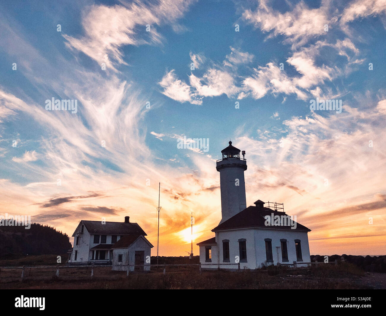 Point Wilson Leuchtturm bei Sonnenuntergang Stockfoto