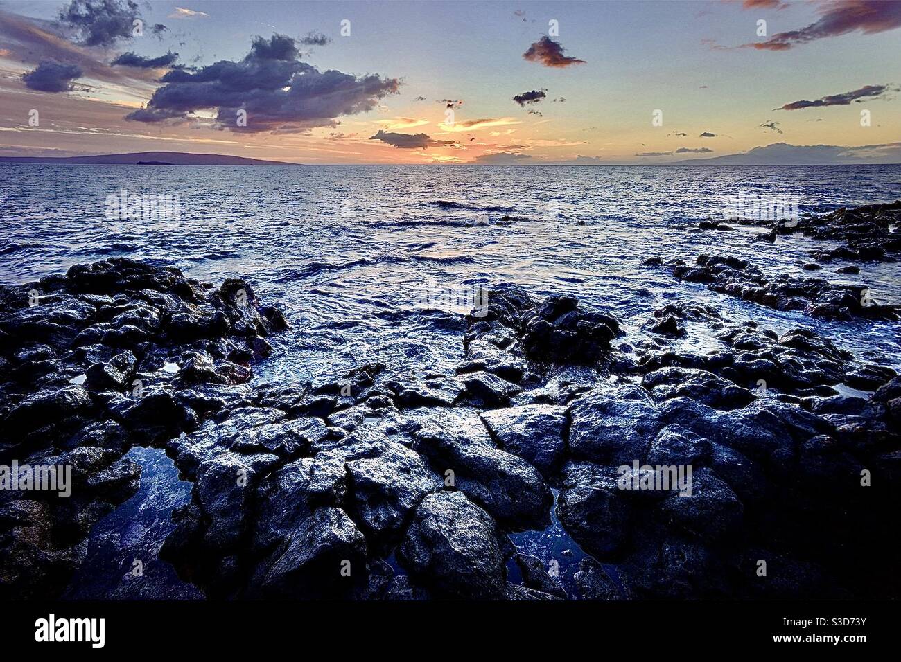 Rockie Sunset Shore Stockfoto
