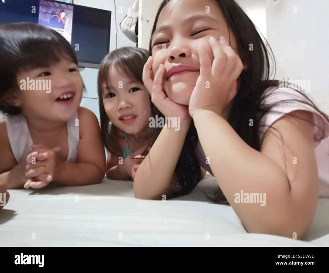 Drei freche Enkelinnen auf den Philippinen Stockfoto