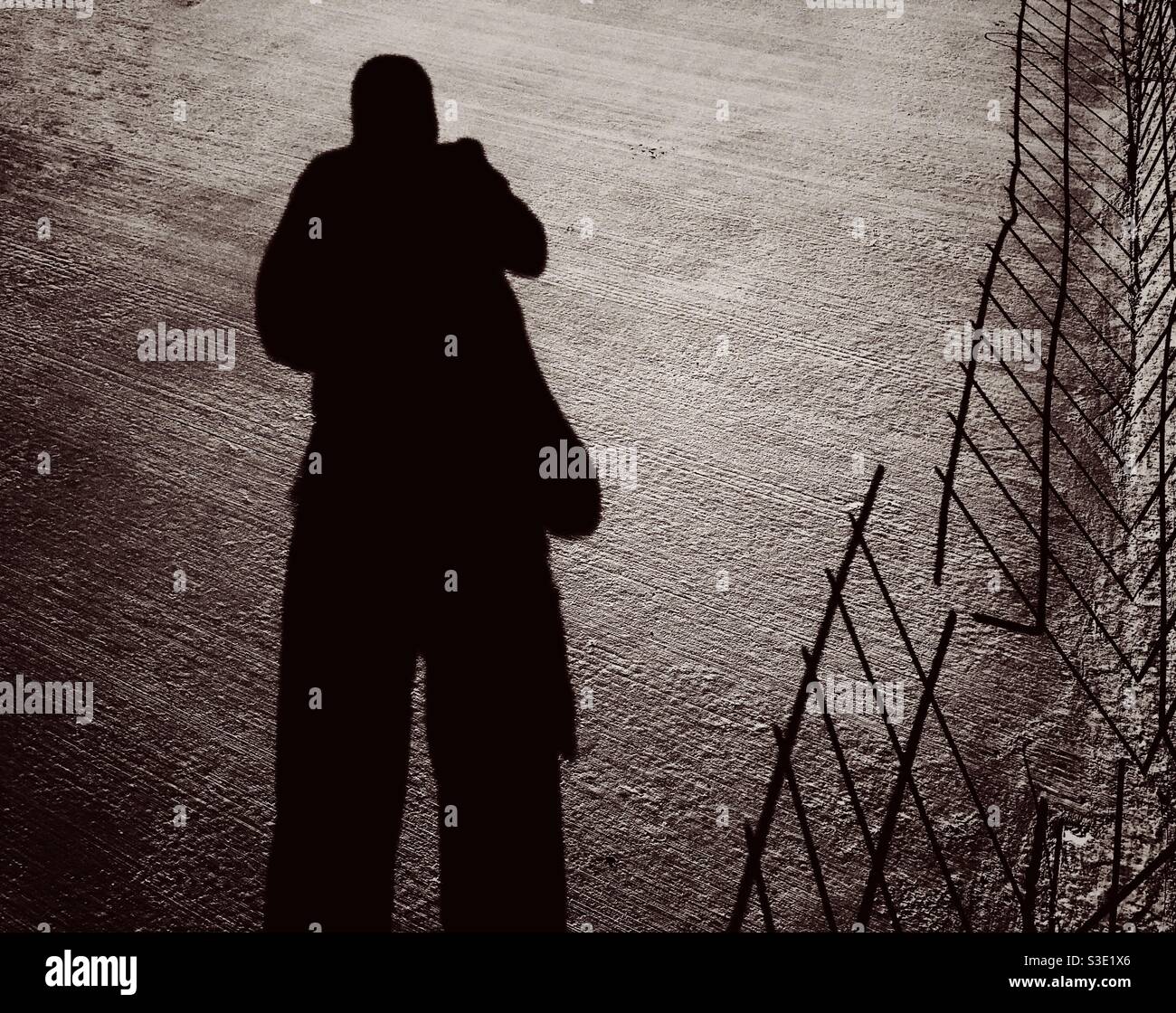 Schatten eines Mannes Stockfoto