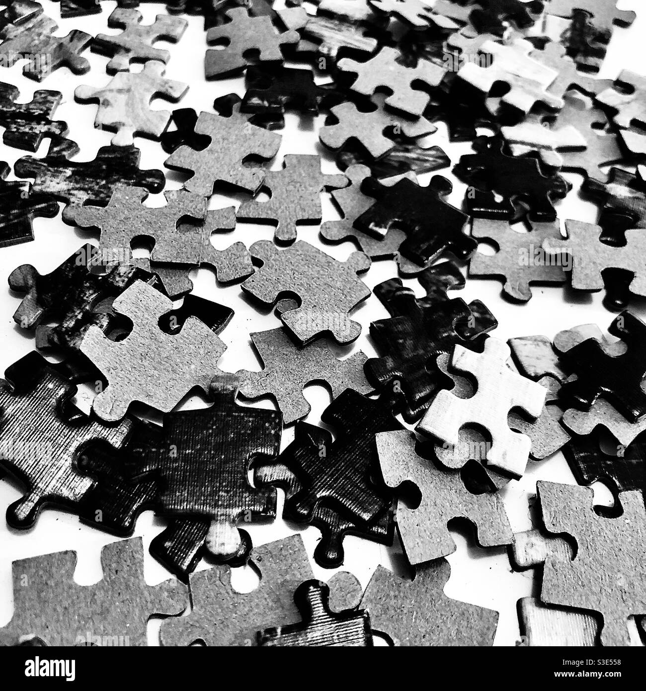 Schwarz und weiß Puzzle-Stücke Stockfoto