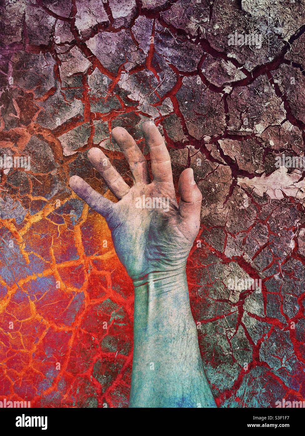 Menschliche Hand in Schmerz und Leid in der Hölle - Smartphone-aufgenommenes Stockfoto