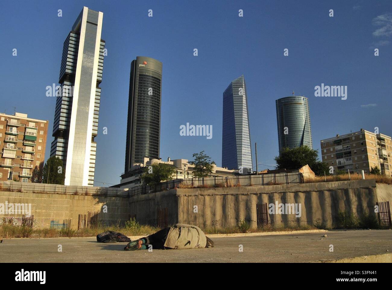 Obdachlose und Finanzdistrikt Stockfoto