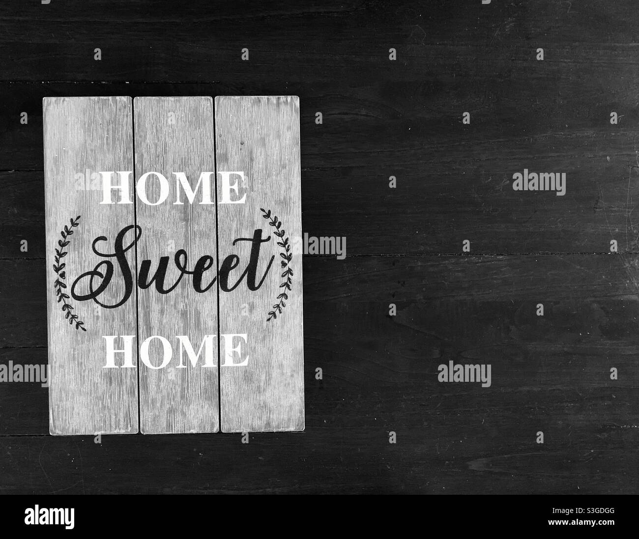 Home sweet Home Zeichen - hölzerne Willkommensschild für das Haus Stockfoto