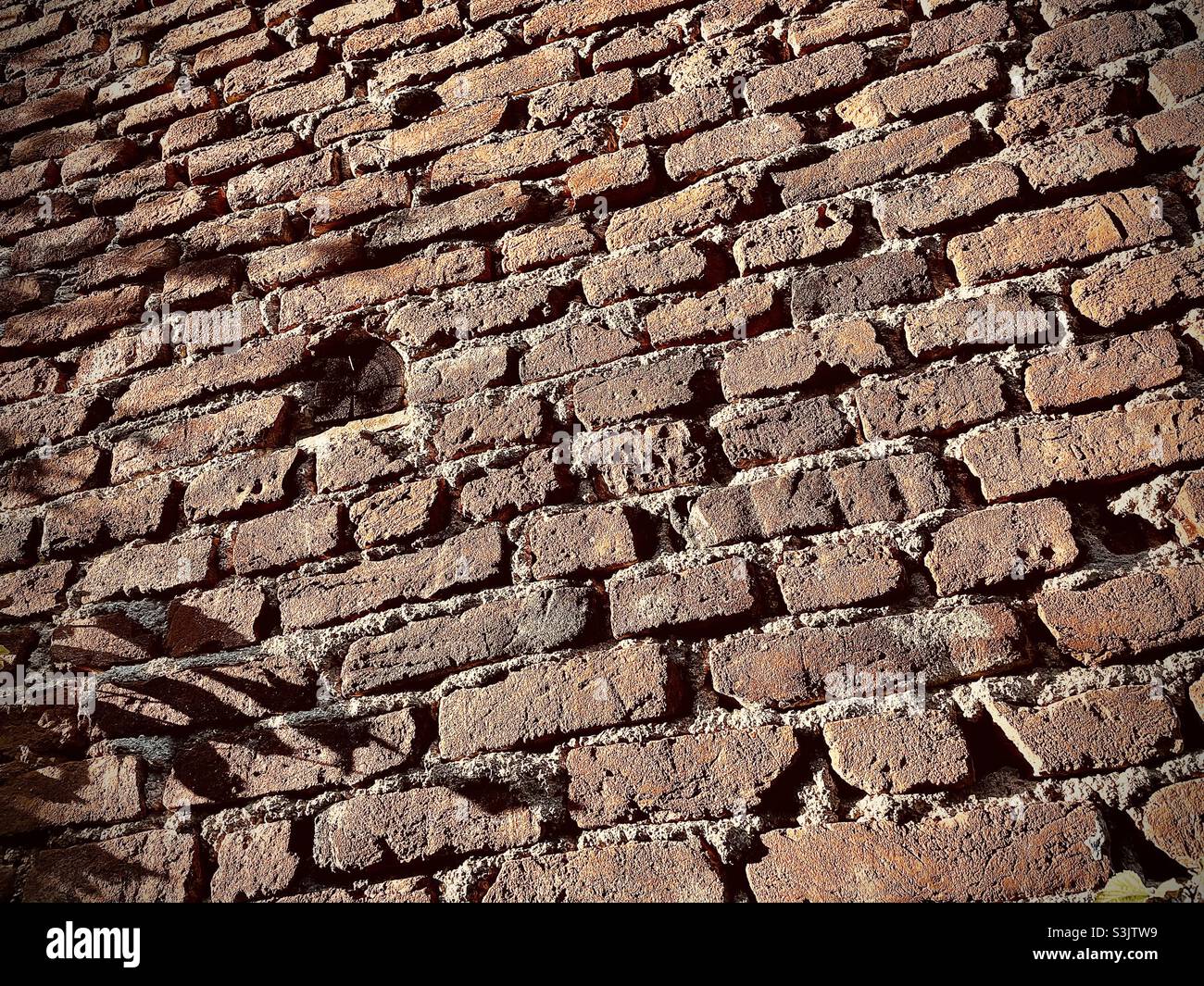 Ein weiterer Stein in der Mauer - Smartphone-aufgenommenes Stockfoto