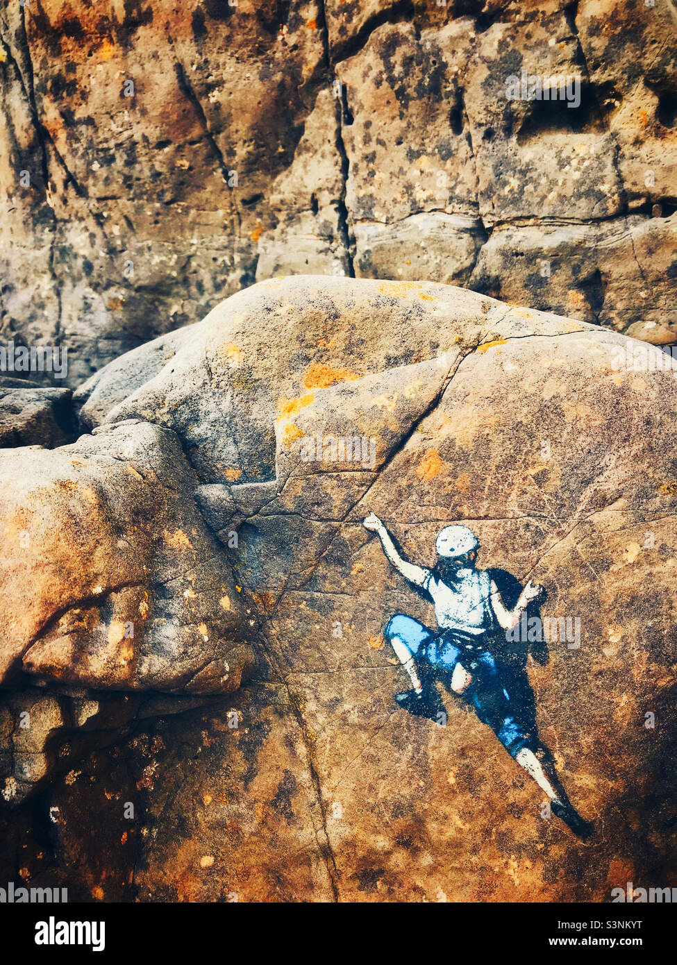 Eine kleine Schablone eines Kletterers Stockfoto