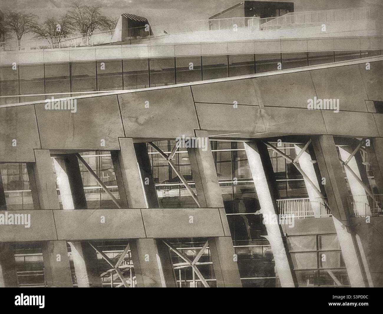 Moderne Architektur wird hier gezeigt, das Thema ist die öffentliche Bibliothek von Salt Lake City, aber das Bild wurde geändert, um vintage und antik zu sehen. Eine Studie in Kontrasten. Alt trifft neu. Stockfoto