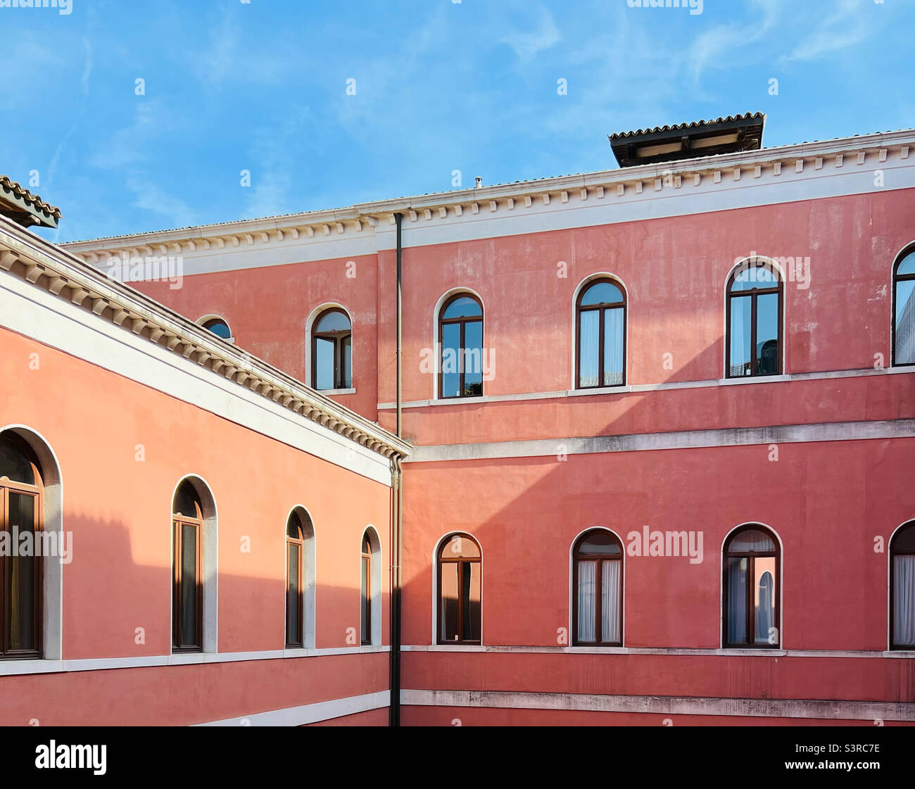 Rosafarbene italienische Wände Stockfoto