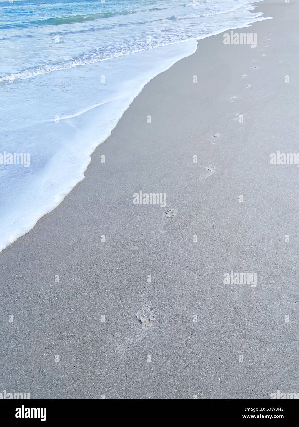 Fußspuren im sand Stockfoto