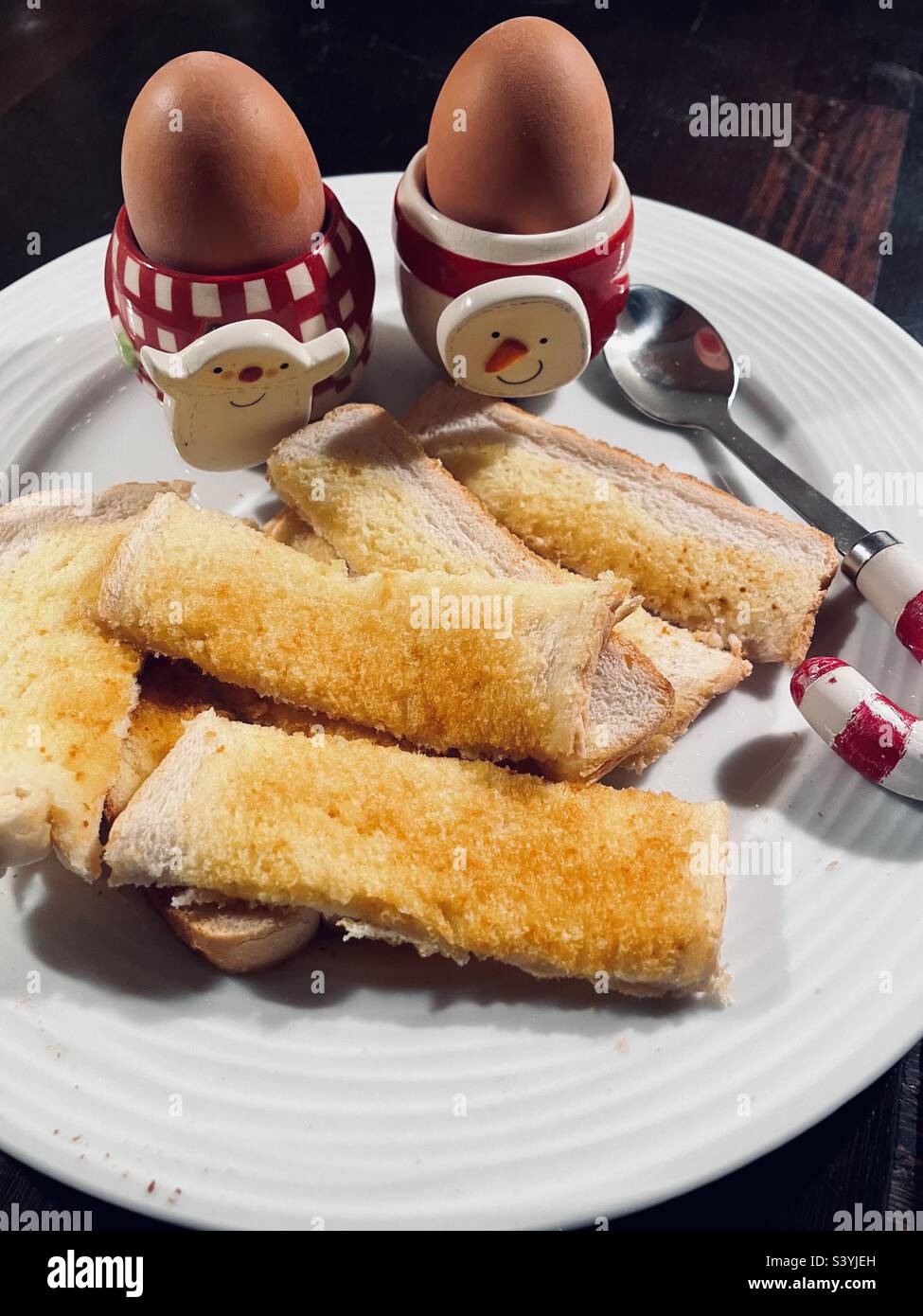 Dippy Ei und Finger für Weihnachten Frühstück. Stockfoto