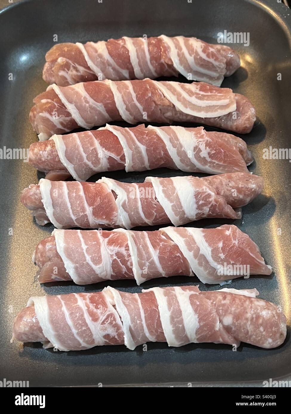 Schweine in Decken, bereit zum Kochen - Smartphone-aufgenommenes Stockfoto