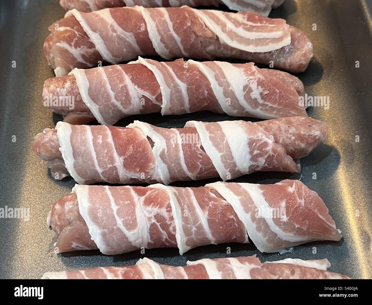 Schweine in Decken, bereit zum Kochen - Smartphone-aufgenommenes Stockfoto
