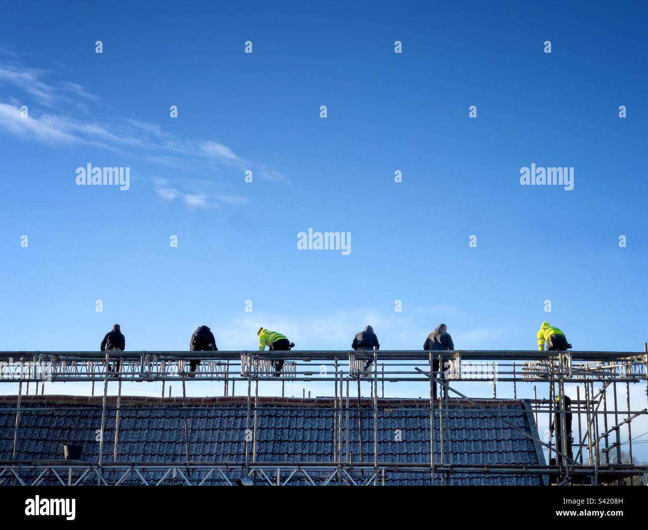 Dachdecker. - Smartphone-aufgenommenes Stockfoto