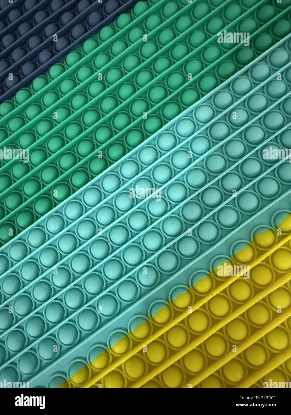 Abstrakter Hintergrund bunter Gummikreise Stockfoto