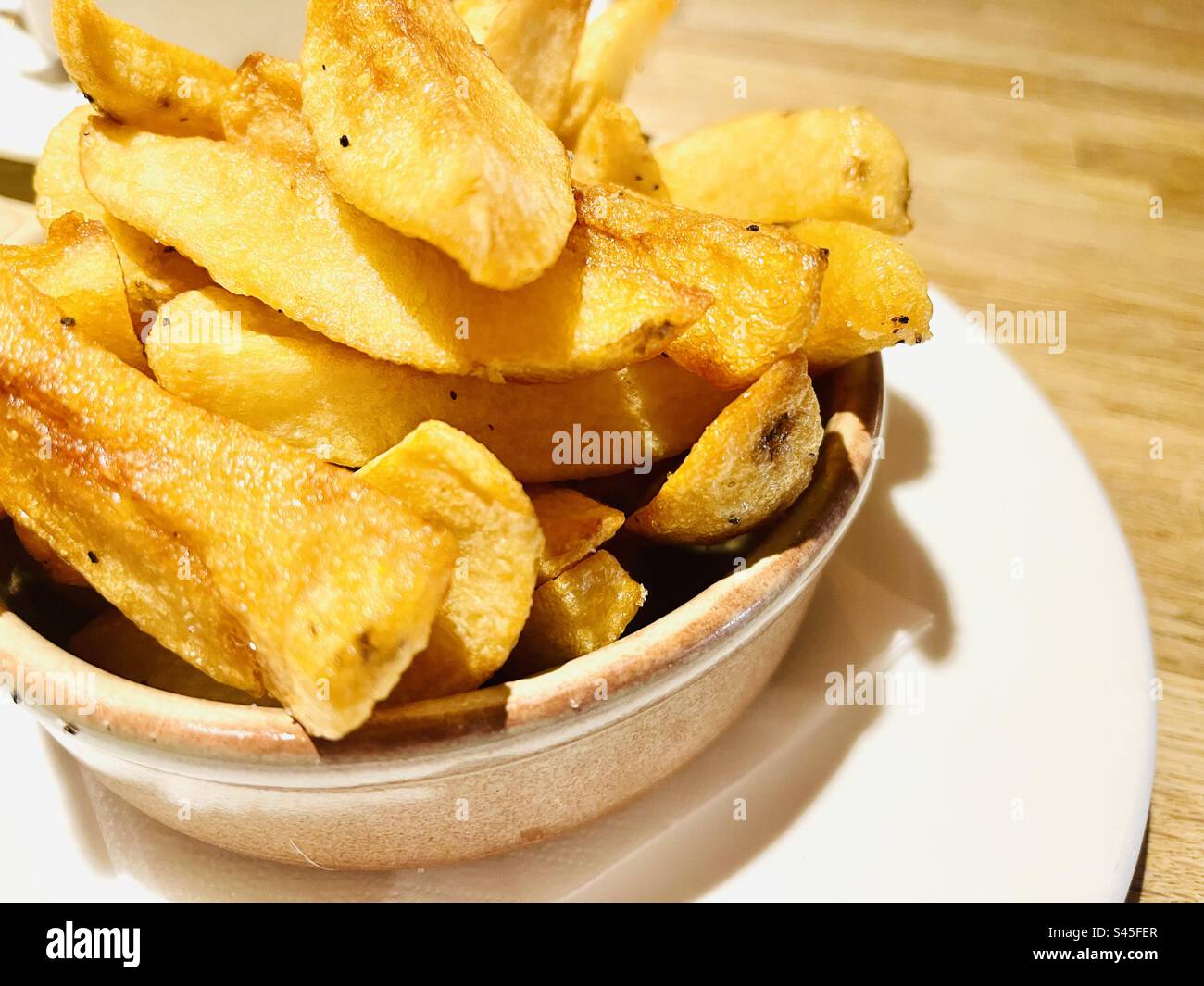 Goldene Chips Stockfoto