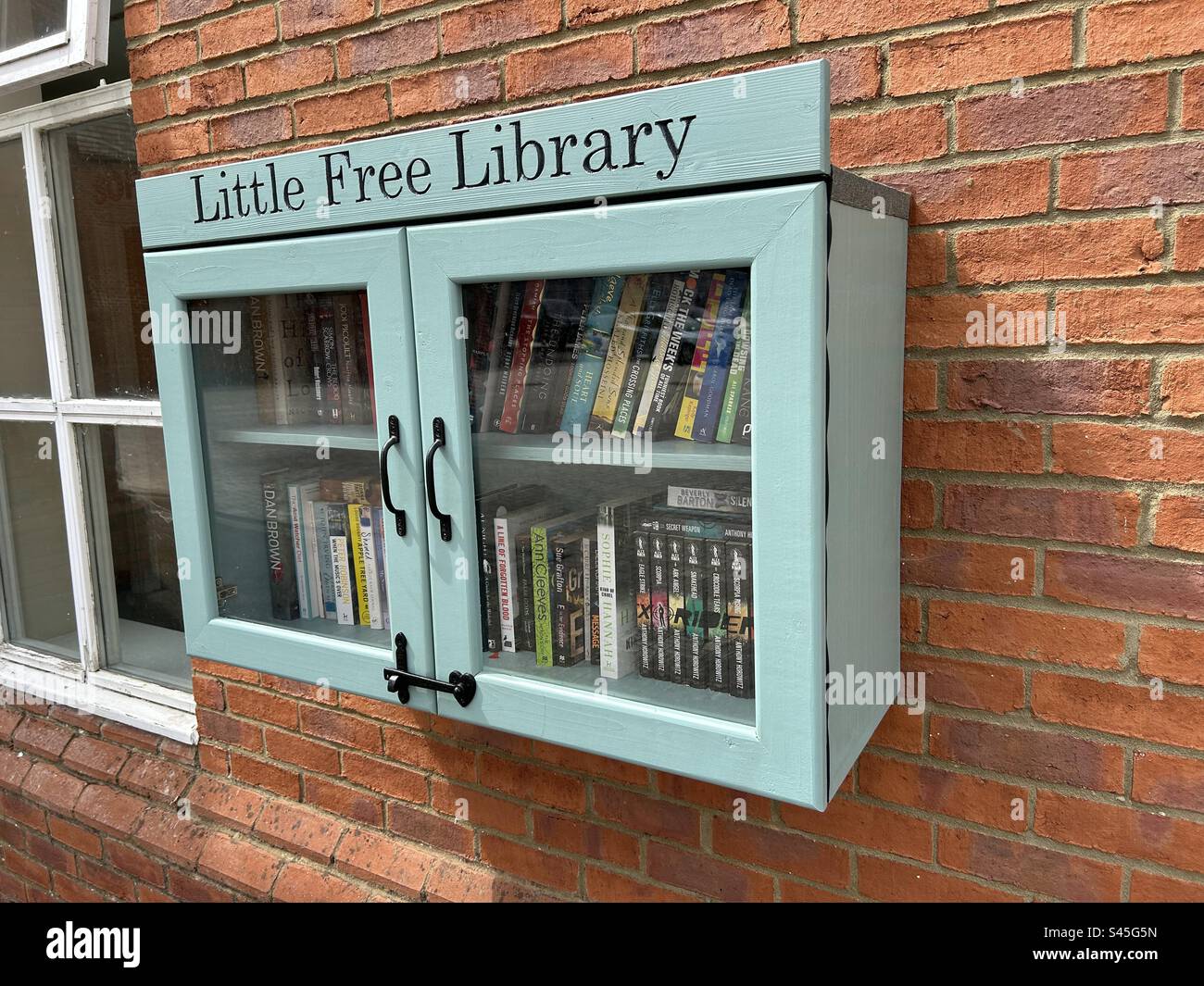 Little Free Library in England, Großbritannien. Stockfoto