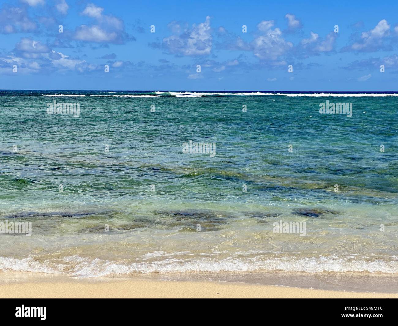 Der perfekte Strandtag. Isoliert. - Smartphone-aufgenommenes Stockfoto