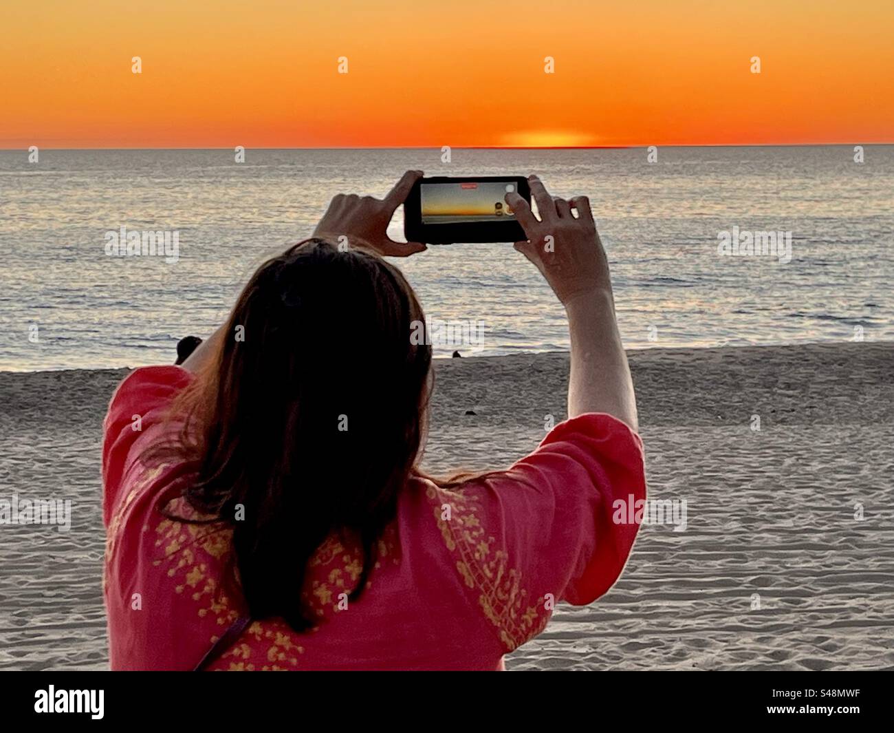 IPhone Sonnenuntergangsfoto am Strand von malibu in Kalifornien - Smartphone-aufgenommenes Stockfoto