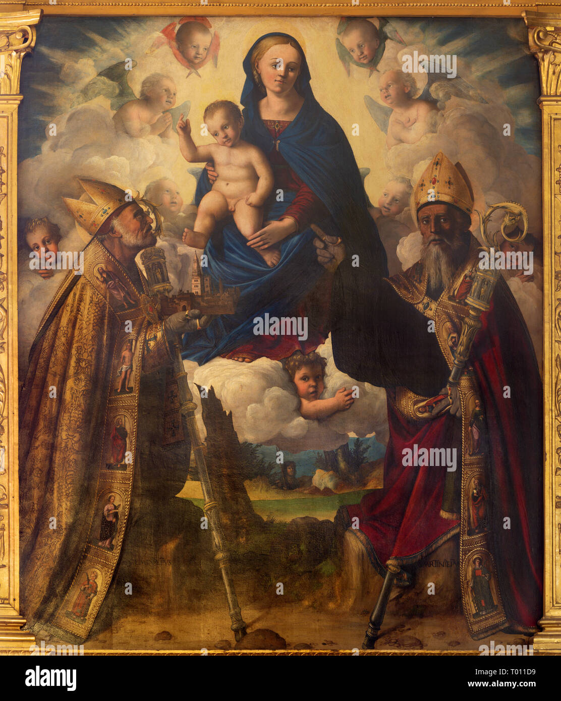 MODENA, Italien - 14 April, 2018: Das Gemälde der Madonna mit dem st. Matin und St. Geminianus in Kirche Abazzia di San Pietro von Filippo da Verona Stockfoto
