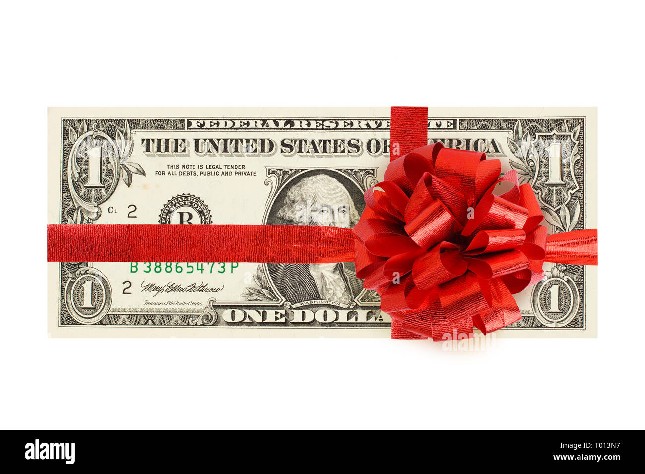 1 Dollar Bargeld mit roter Schleife auf weißem Hintergrund. Ein US-Dollar Bill Stockfoto