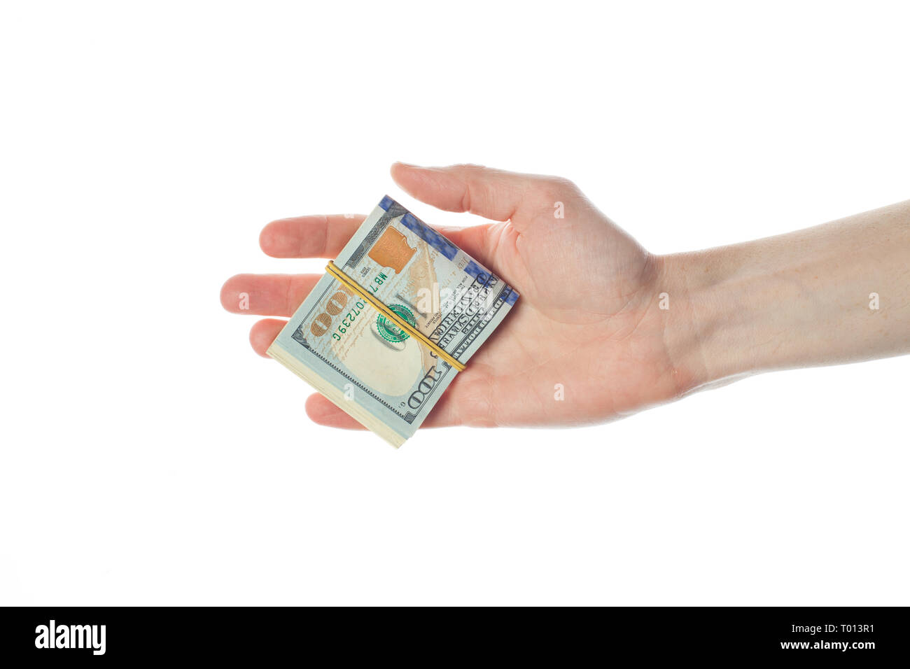 Amerikanische Dollar Banknoten in männlicher Hand auf weißem Hintergrund. 100 US-Dollar Bill cash Geld Stockfoto
