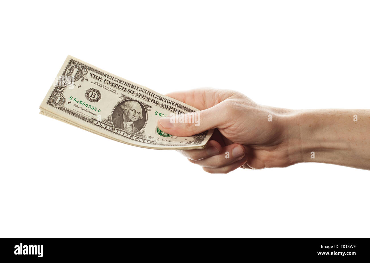 Amerikanische Dollars in der Hand auf weißem Hintergrund. Ein Dollar Hinweis Geld Währung Stockfoto
