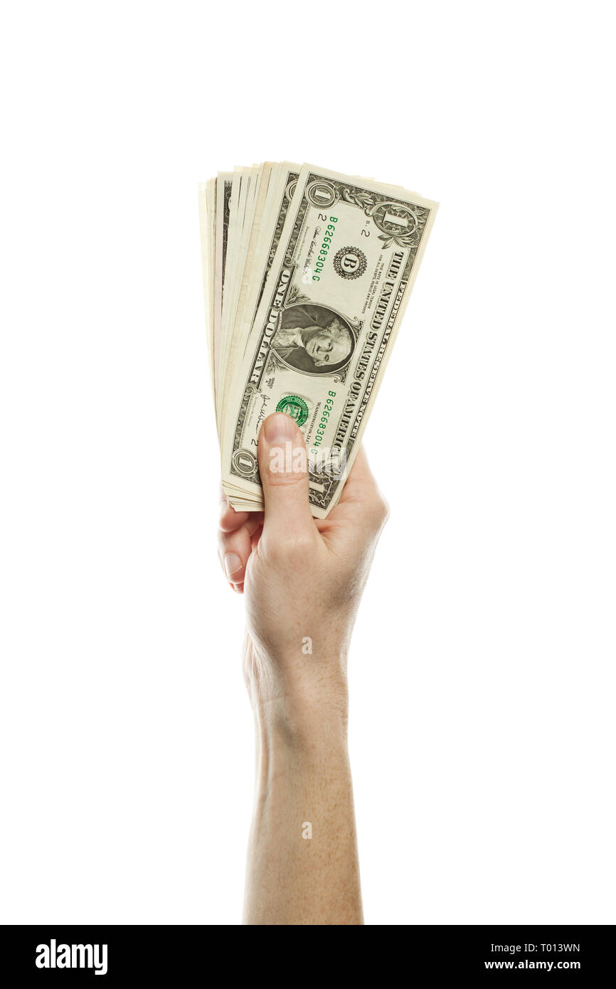 Eine amerikanische Dollar Bargeld in männlicher Hand isoliert. Tipps und steuerliche Konzept mit 1 US-Dollar Banknote Stockfoto