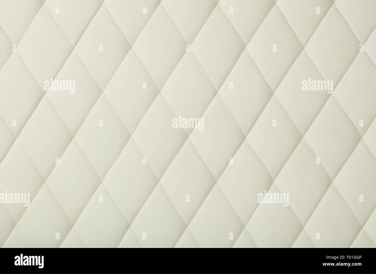 Hintergrund Textur aus weißem Leder weich getuftete Möbel oder wandpaneele Polsterung mit tiefen Rautenmuster, in der Nähe Stockfoto