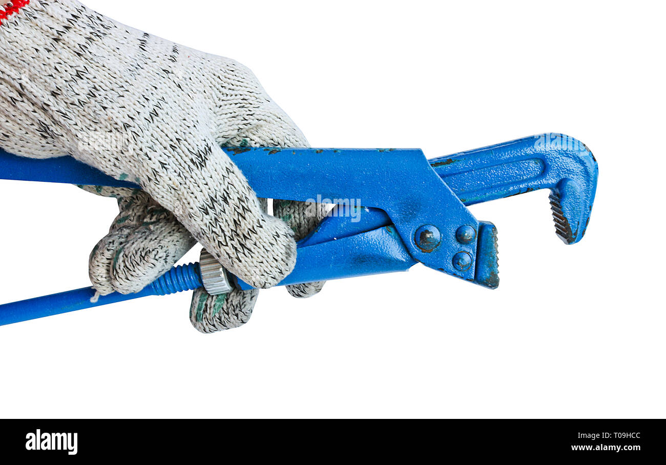 Gas verstellbarer Schraubenschlüssel in der Hand eines Mannes in einen Handschuh. Schlüsseldienst Werkzeug. Stockfoto