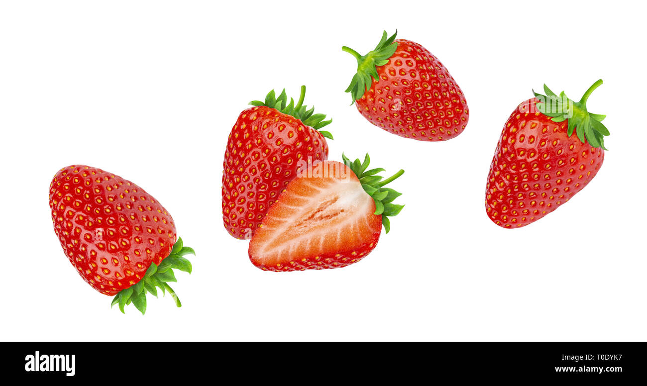 Fallende Erdbeeren auf weißem Hintergrund Stockfoto