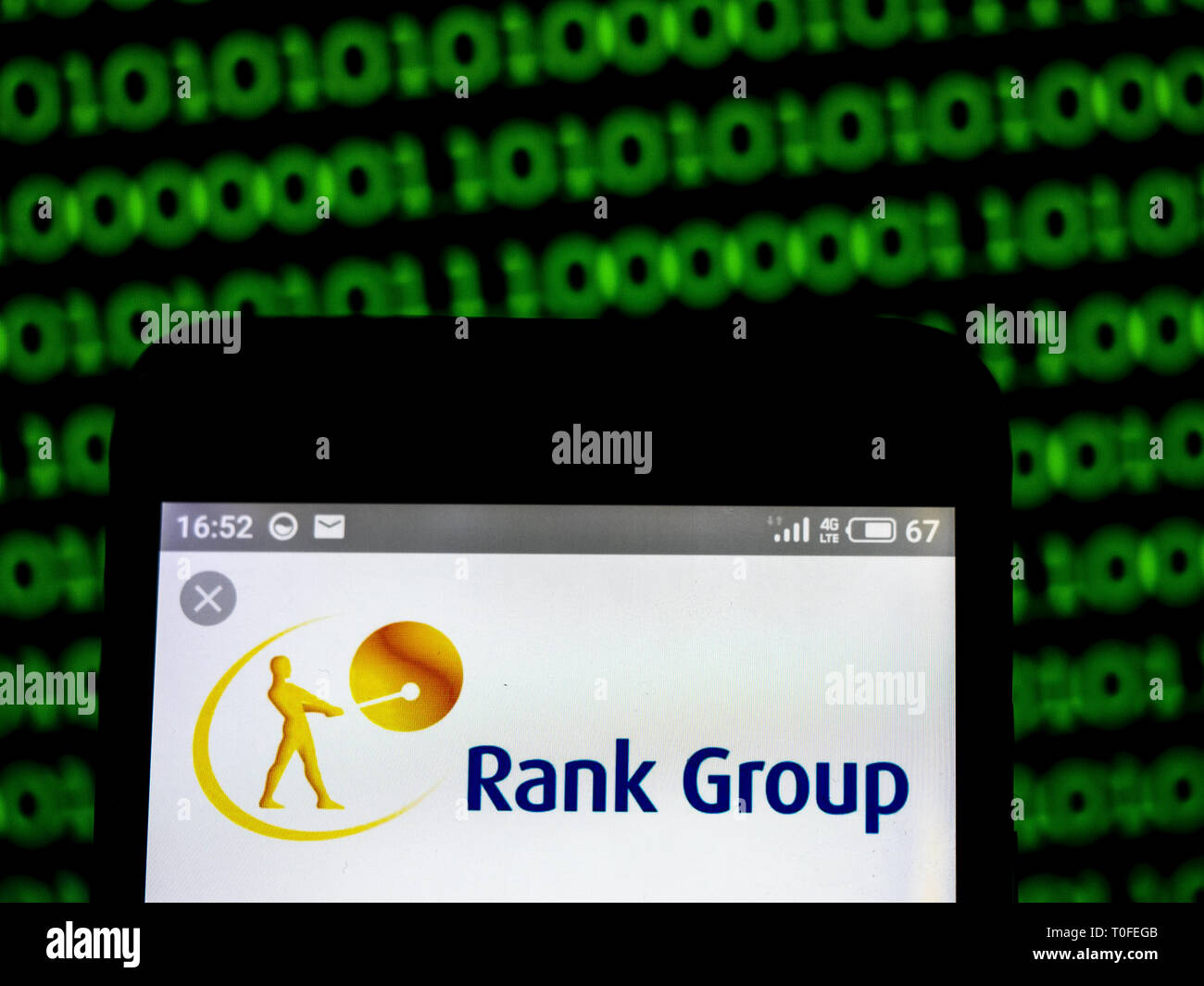 In der Ukraine. 19 Mär, 2019. Rank Group Finance plc Firmenlogo gesehen auf einem Smartphone angezeigt. Quelle: Igor Golovniov/SOPA Images/ZUMA Draht/Alamy leben Nachrichten Stockfoto