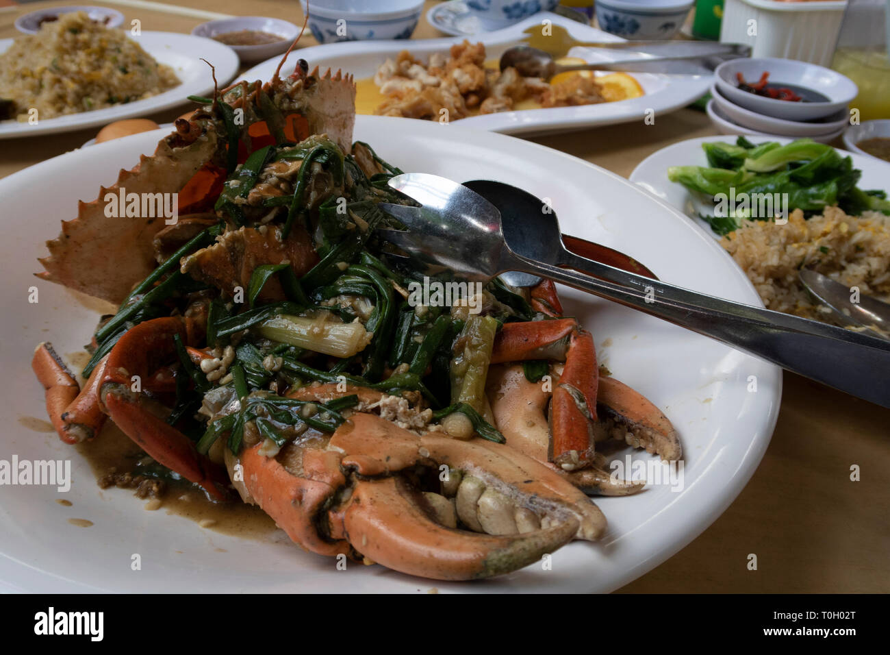 Weißer Pfeffer Crab, einem beliebten Meeresfrüchte Teller in Restaurants und Hawker Center in Singapur verkauft. Stockfoto