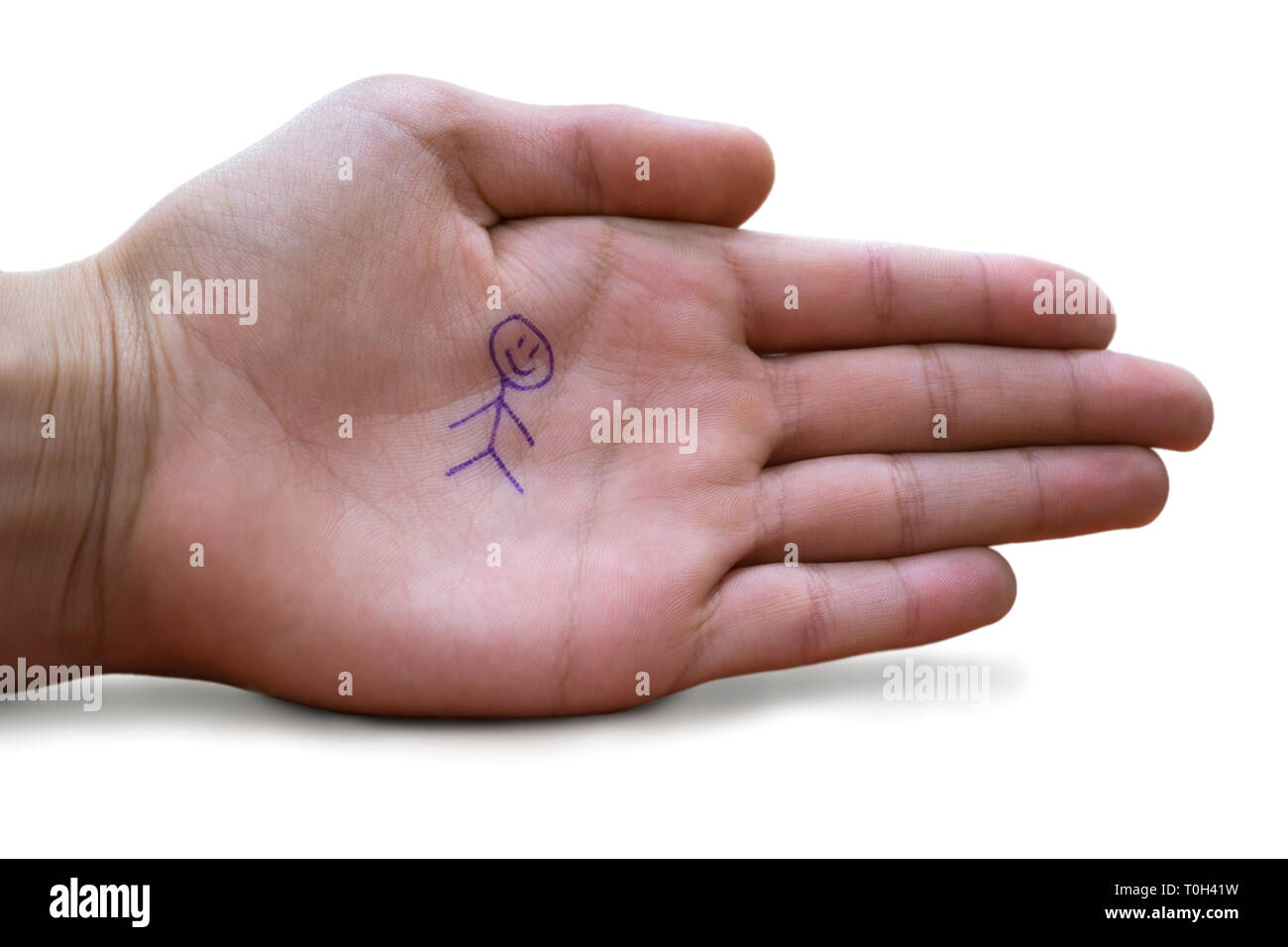 Childs offene Hand mit einem geheimen glücklich Symbol auf weißem Hintergrund Stockfoto