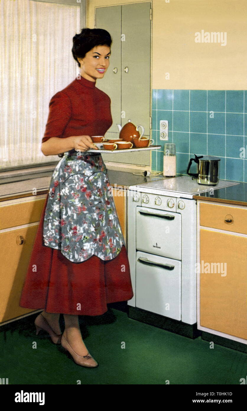 Haushalt, Hausfrau in der Küche, Werbung für Siemens Elektroherd, durch die  siemens-schuckertwerke Aktiengesellschaft, Deutschland, 1953,  Additional-Rights - Clearance-Info - Not-Available Stockfotografie - Alamy