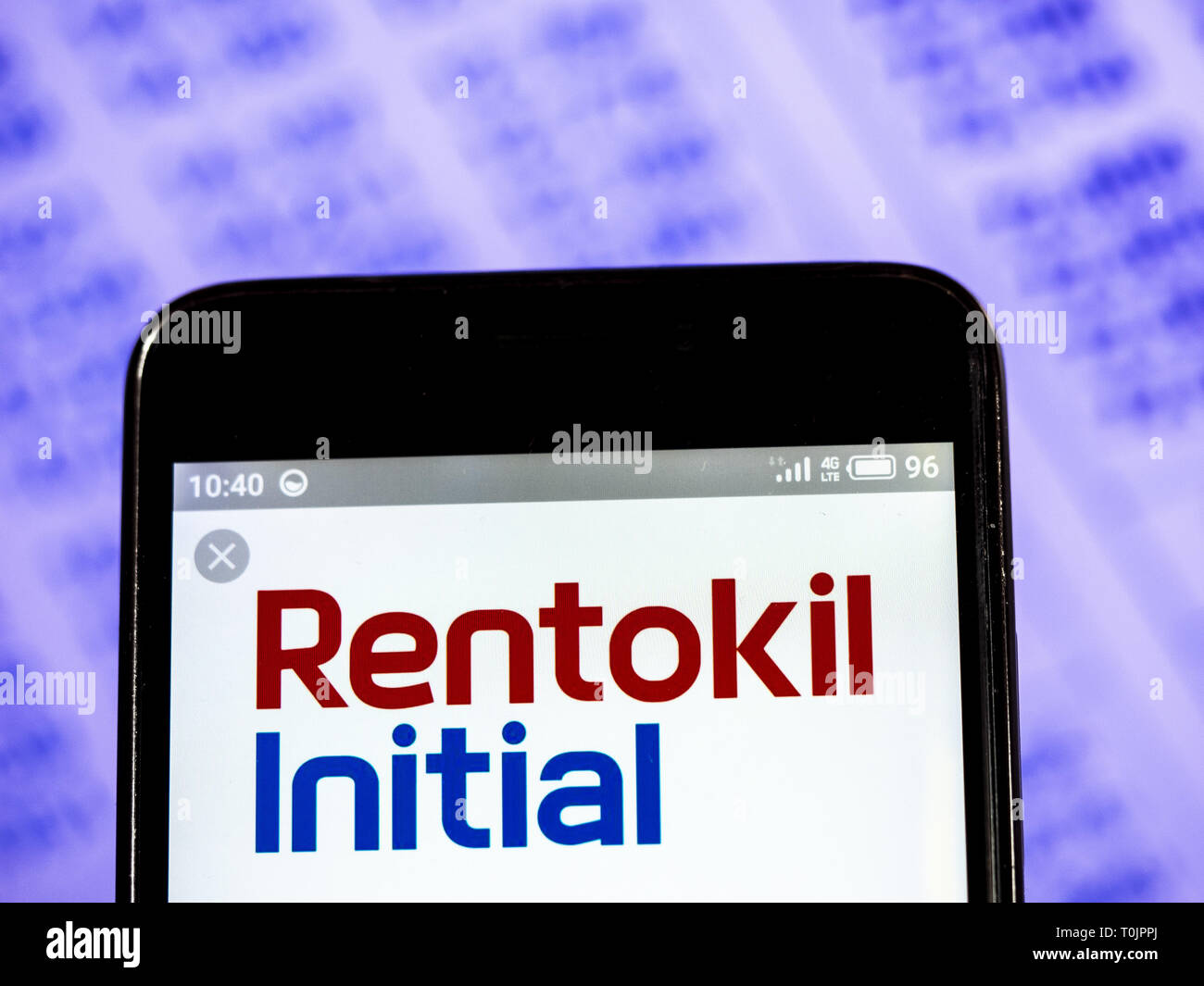 In der Ukraine. 20 Mär, 2019. Rentokil Initial plc Firmenlogo gesehen auf einem Smartphone angezeigt. Quelle: Igor Golovniov/SOPA Images/ZUMA Draht/Alamy leben Nachrichten Stockfoto