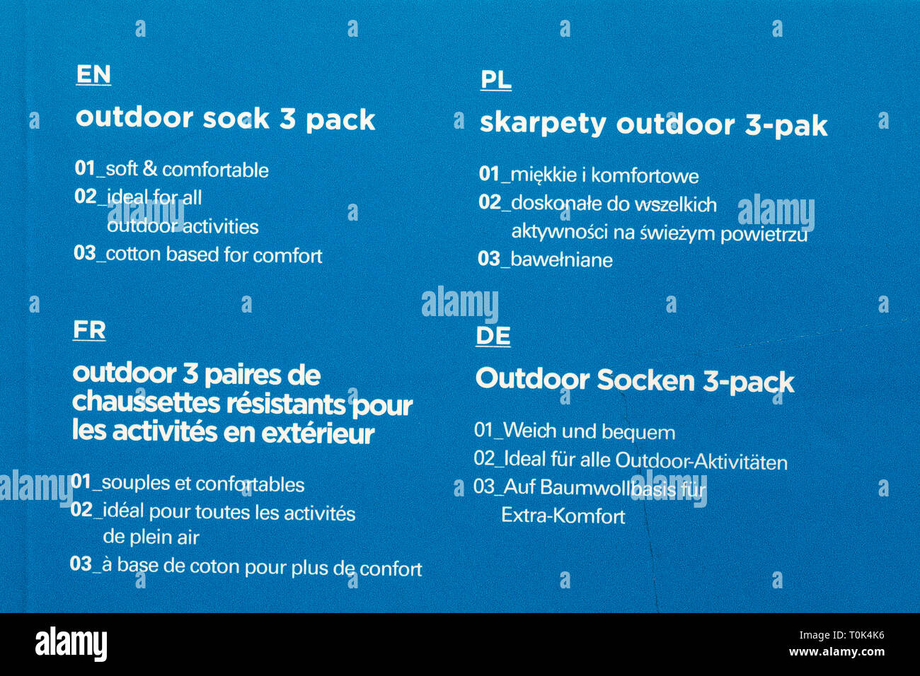 Informationen zu Outdoor sock 3 pack in vier verschiedenen Sprachen - Englisch, Polnisch, Französisch und Deutsch Stockfoto