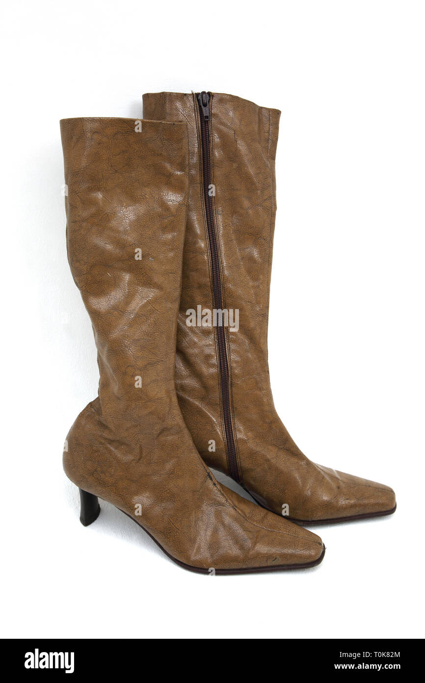 Ein Paar braune Kniehohe Leder High Heel Stiefel Stockfoto