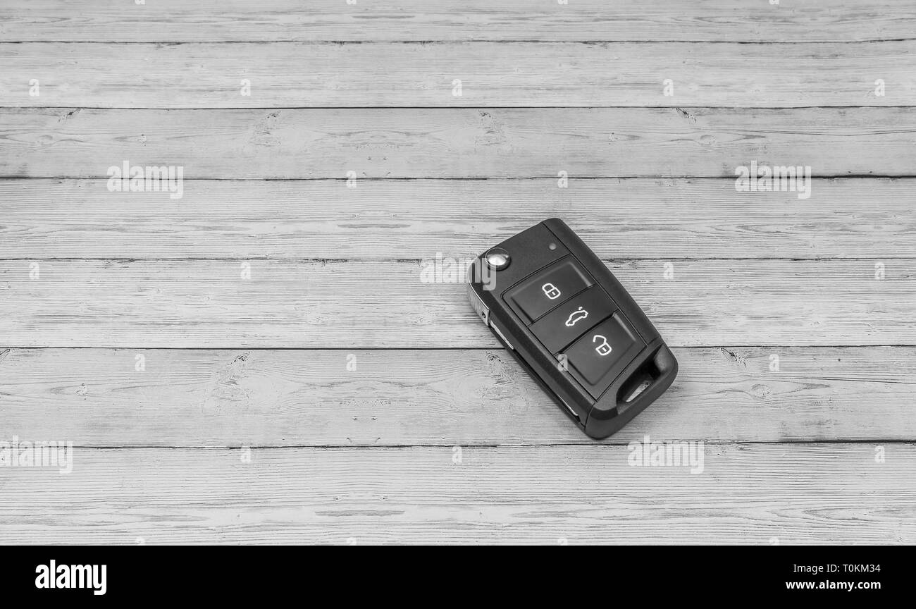 Auto Taste auf getöntem Holz Hintergrund, Ansicht von oben Stockfoto