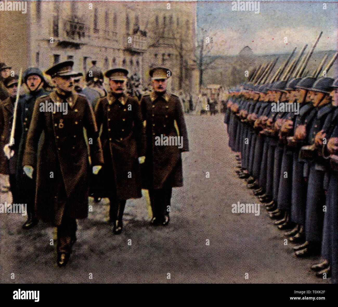 Alliierte Besetzung des Rheinlandes 1918 - 1930, Parade der belgischen Truppen in Aachen, Januar 1927, Farbfoto, Zigarette Karte, Serie 'Die Nachkriegszeit', 1935, Berufe, Rheinland, Beruf, Leistung zu besetzen, Besatzungsmächte, Belgien, Militär, Armee, Streitkräfte, Offiziere, Beamte, Soldaten, Soldaten, Menschen, Preußen, Rheinprovinz, Nordrhein-Westfalen, NRW, Nordrhein, Westfalen, Nordrhein-Westfalen, Nordrhein-Westphalen, Deutschland, Deutsches Reich, Weimarer Republik, 1920, S, 20. Jahrhundert, Parade, Paraden, Farbig, farbig, Nachkriegszeit pe, Additional-Rights - Clearance-Info - Not-Available Stockfoto