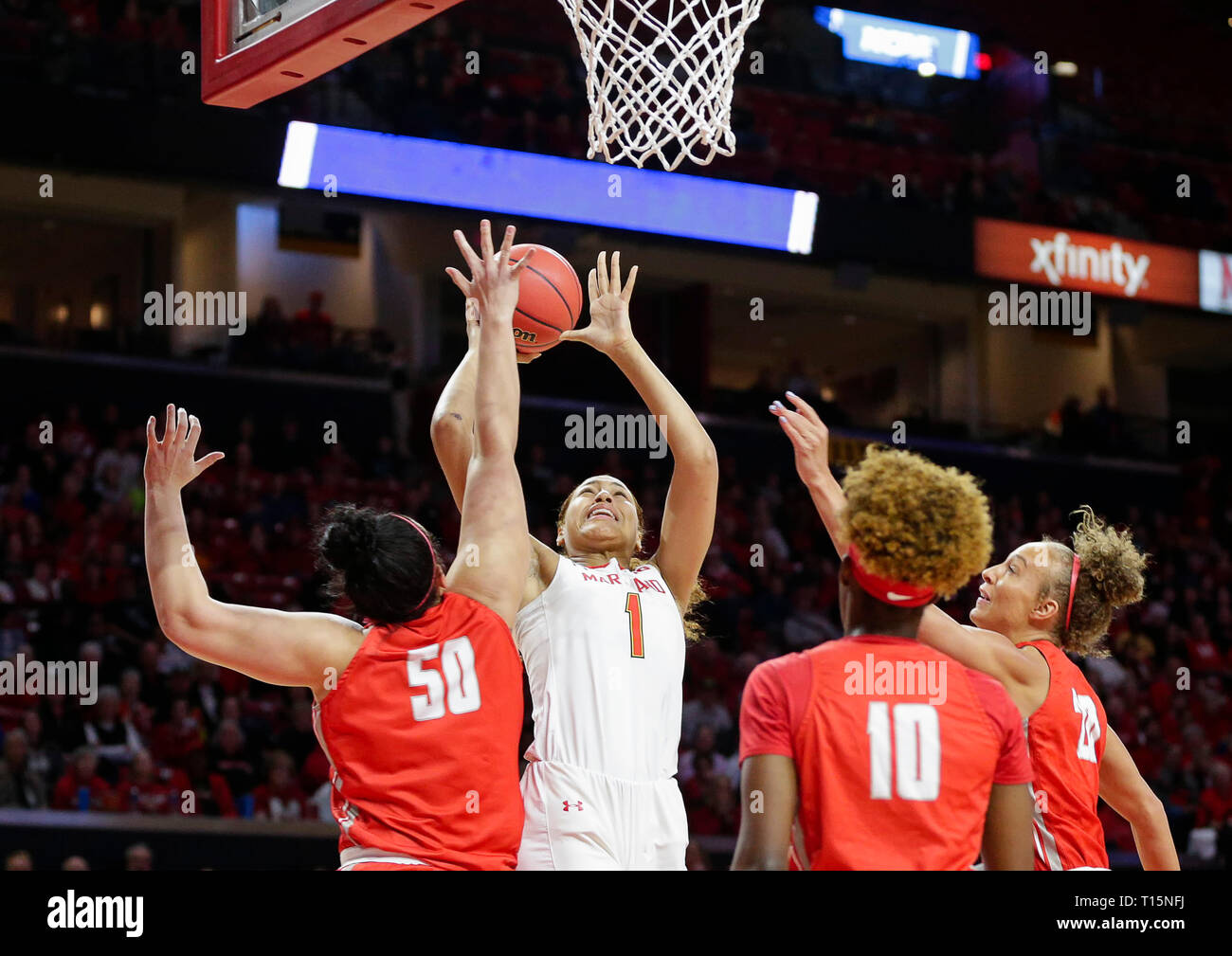 College Park, MD, USA. 23 Mär, 2019. Maryland Dosenschildkröten (1) Shakira Austin einen Schuß während der ersten Runde des NCAA-Meisterschaft das Spiel der Frauen zwischen der Universität von Maryland Dosenschildkröten und die Radford Highlanders an der Xfinity Zentrum in College Park, Md. Justin Cooper/CSM/Alamy leben Nachrichten Stockfoto
