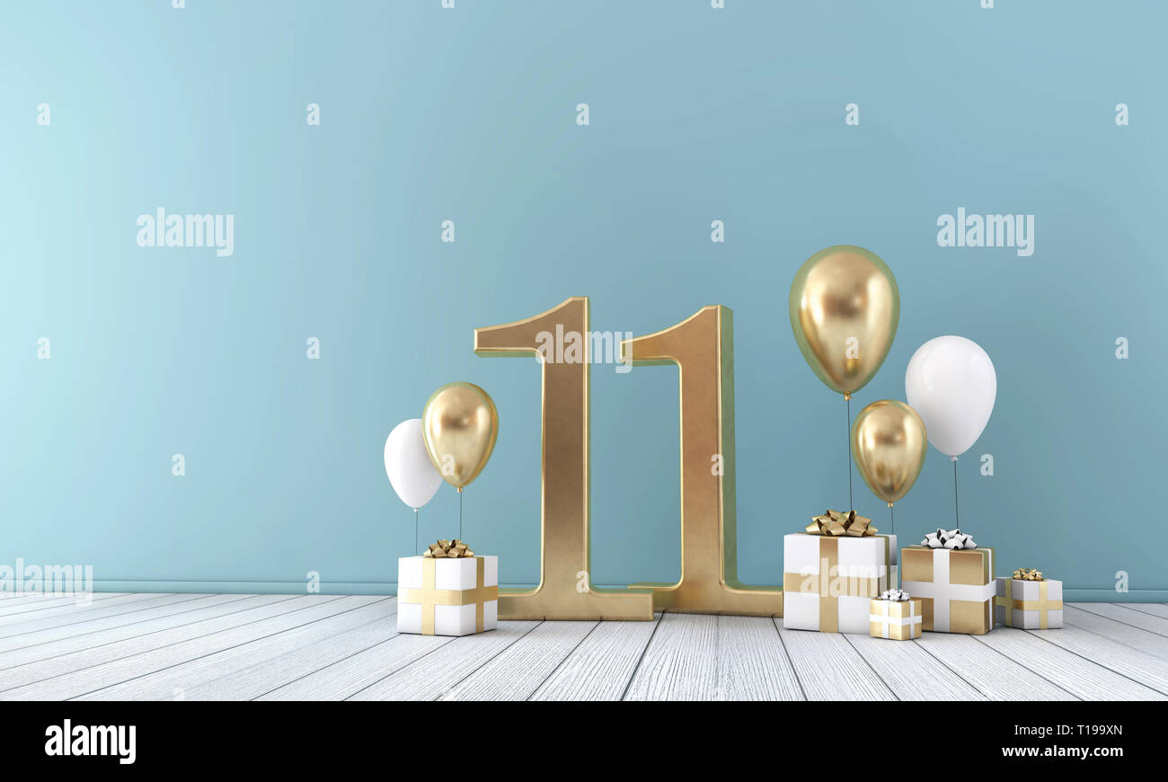 Nummer 11 Party Feier Zimmer mit goldenen und weißen Luftballons und Geschenkboxen. Stockfoto