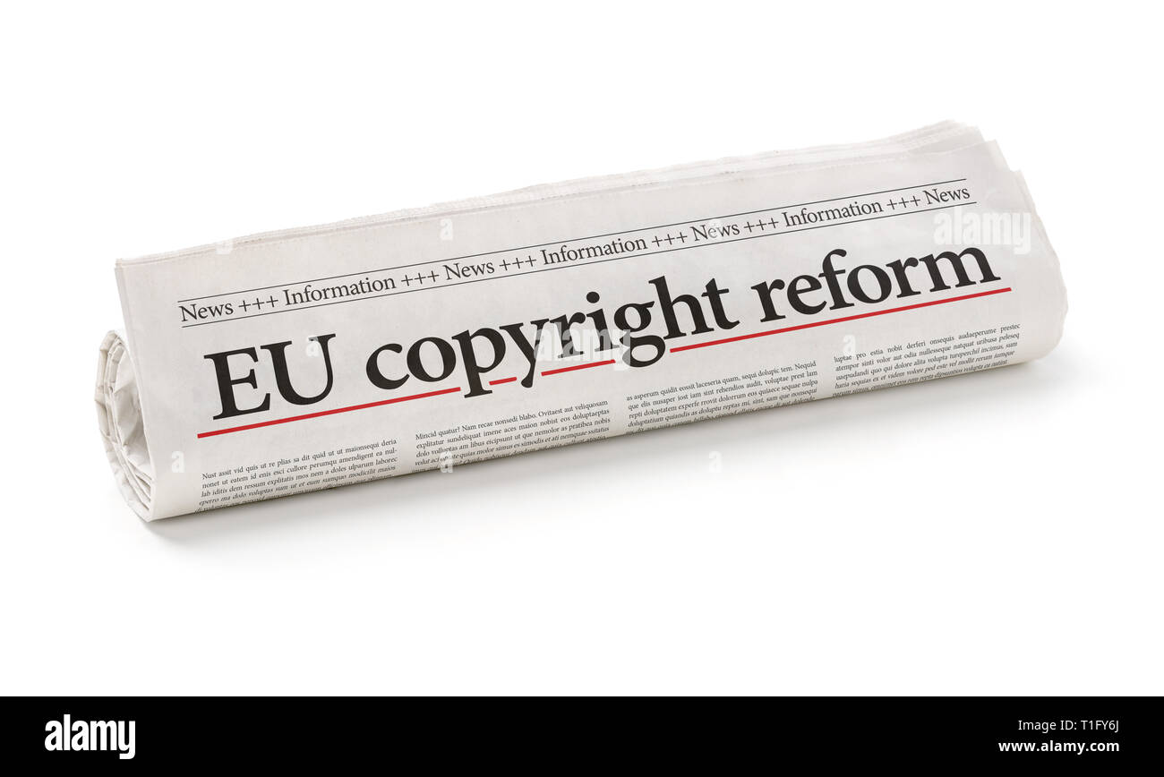 Gerollten Zeitung mit der Schlagzeile EU copyright Reform Stockfoto