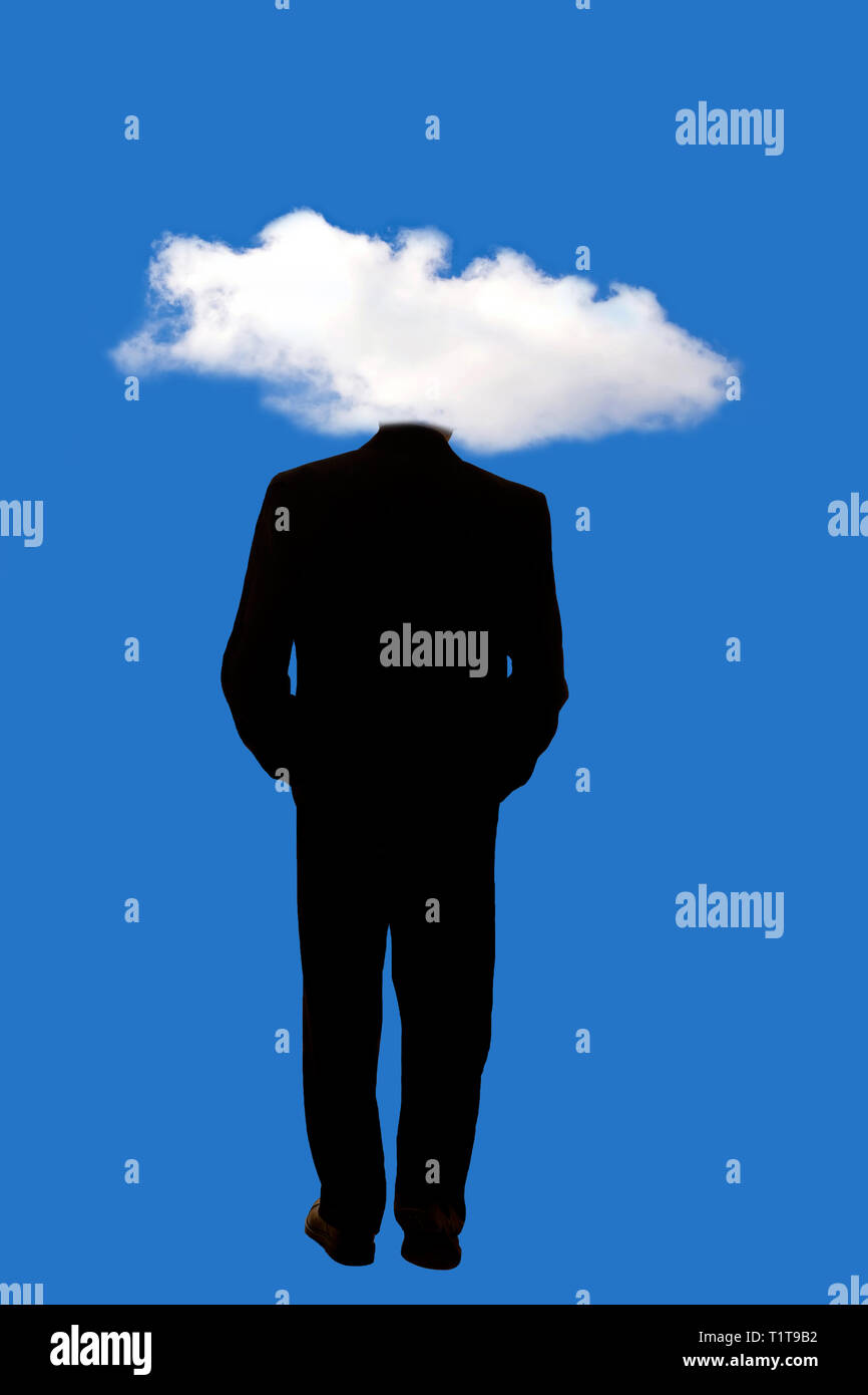 Mann in Anzug mit seinen Kopf in eine weiße Wolke versteckt Stockfoto