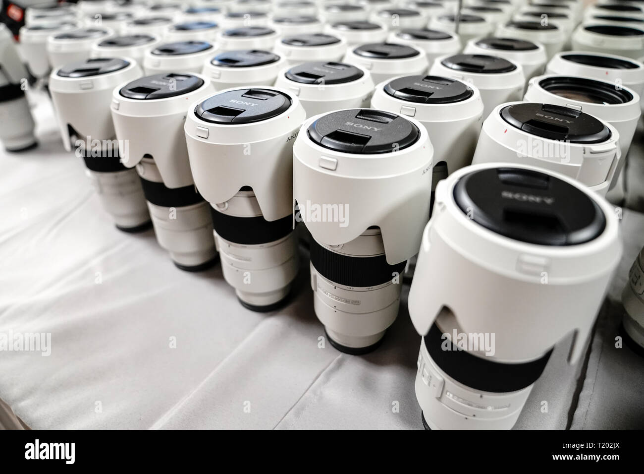 Tenerife, Spain - March 21, 2019: Sony 70-200 lenses for Alpha 9 series are stacked during a conference for photographers. Stockfoto