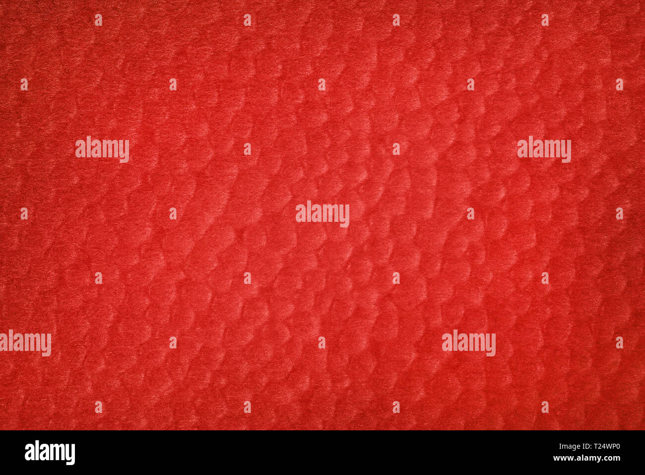 Abstrakte texturierte roten Hintergrund. Luftblasen auf Backstein farbiges Papier Stockfoto
