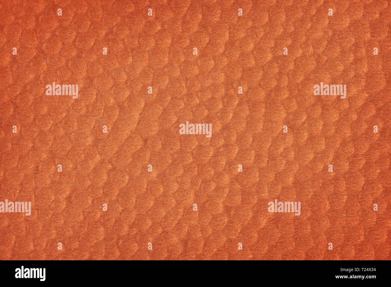 Abstrakte texturierte orange hinterlegt. Luftblasen auf Backstein farbiges Papier Stockfoto