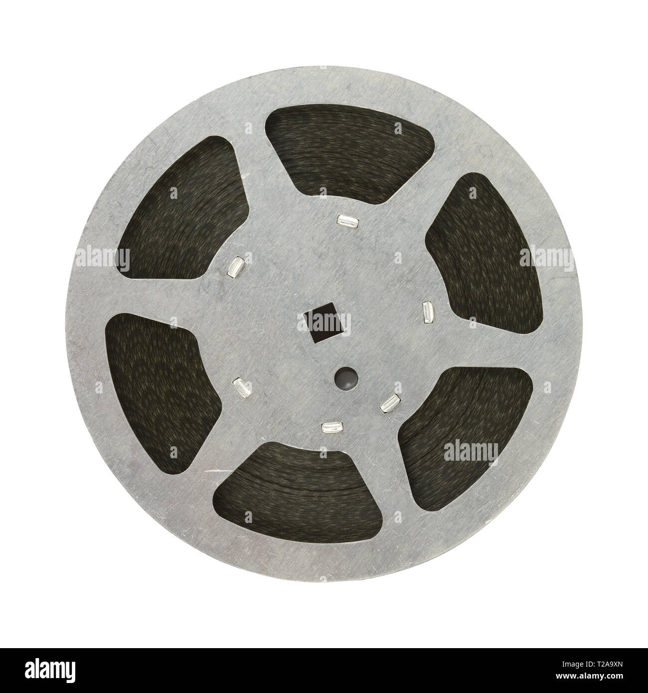 Film in der Haspel auf weißem Hintergrund. Stockfoto