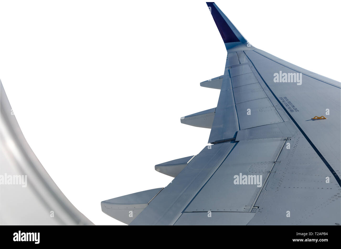 Flugzeugflügel, Blick durch das Flugzeug Fenster. Auf weissem Hintergrund. Stockfoto