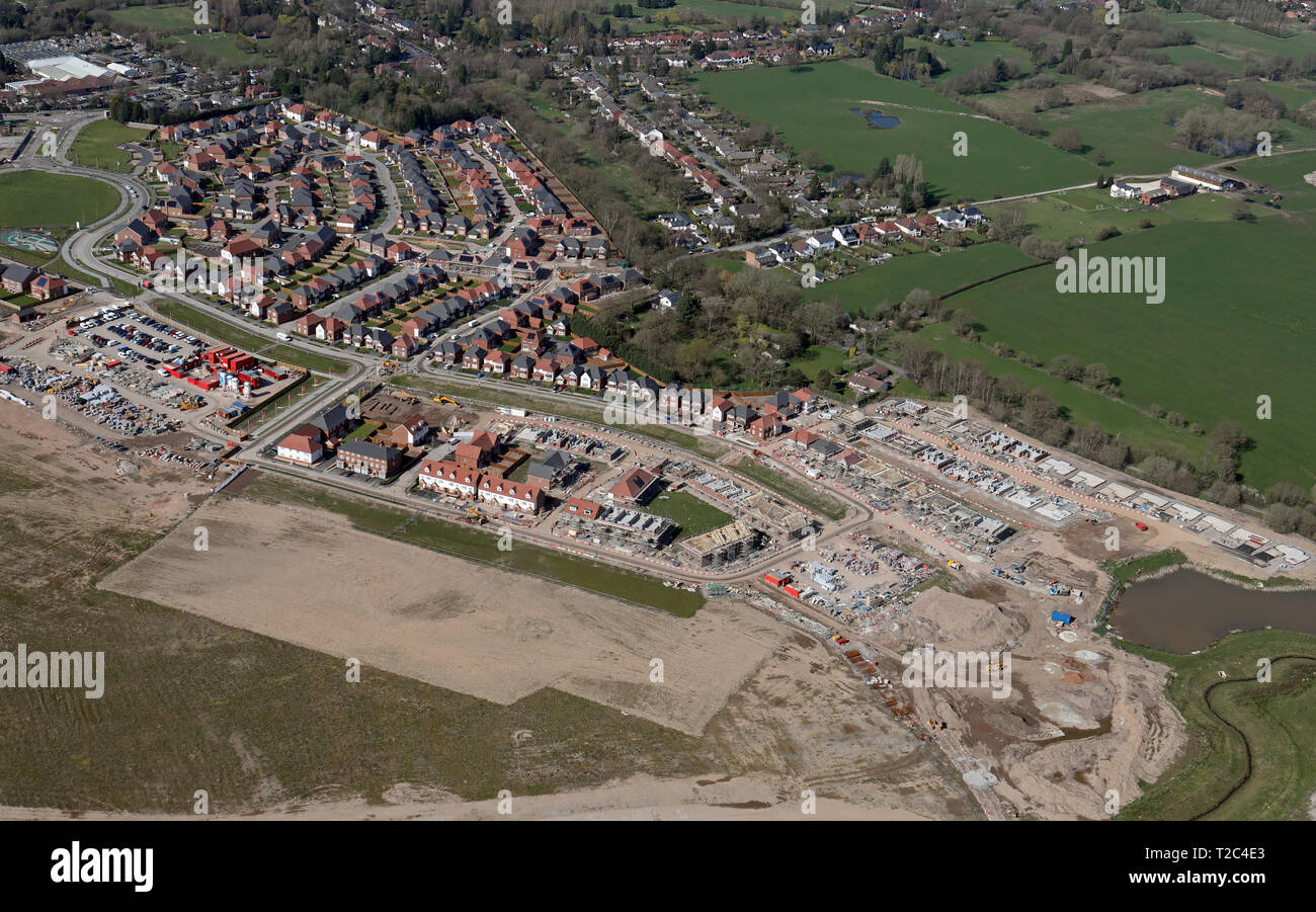 Luftbild der neuen Häuser im Bau auf dem alten Woodford Flugplatz site an Adlington, Cheshire Stockfoto