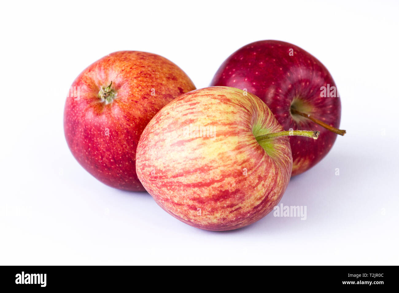 Drei Äpfel auf einem weißen Hintergrund Stockfoto